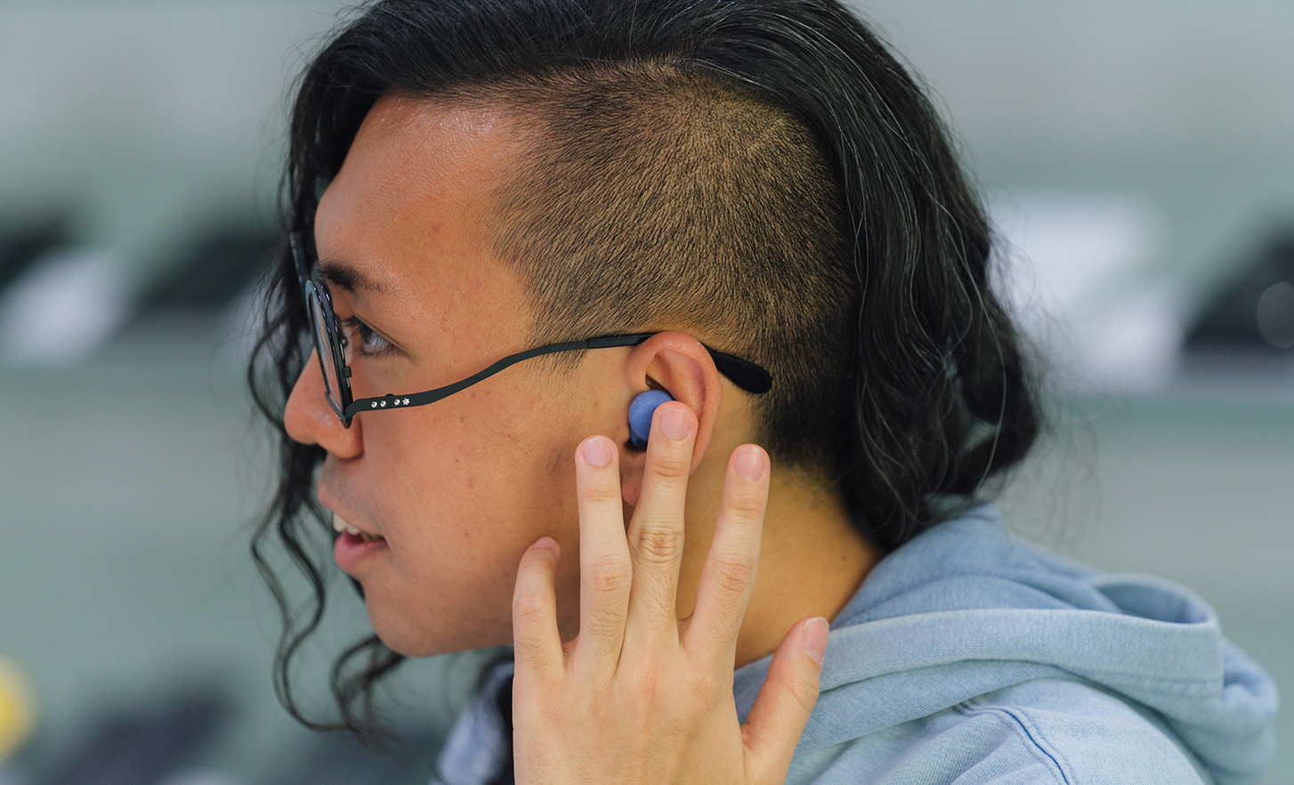 Employee is wearing the headphones