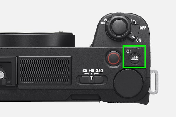 Product image of the camera top with the Bokeh switch button indicated with a green square