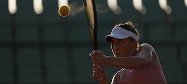 Example image of woman playing tennis