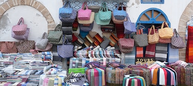 Sample image of a Moroccan market stall with a variety of colourful bags and fabrics on display, showing the resolution